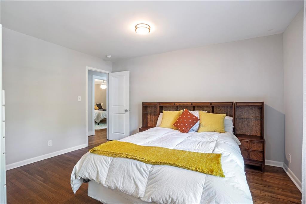2632 Hawthorne Place Northeast Atlanta, GA 30345 - Photo 32 of 40 a bed sitting in a bedroom and a night stand