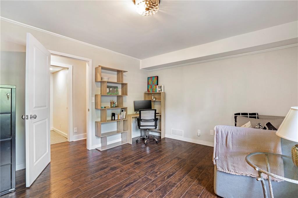 2632 Hawthorne Place Northeast Atlanta, GA 30345 - Photo 35 of 40 a living room with furniture and wooden floor