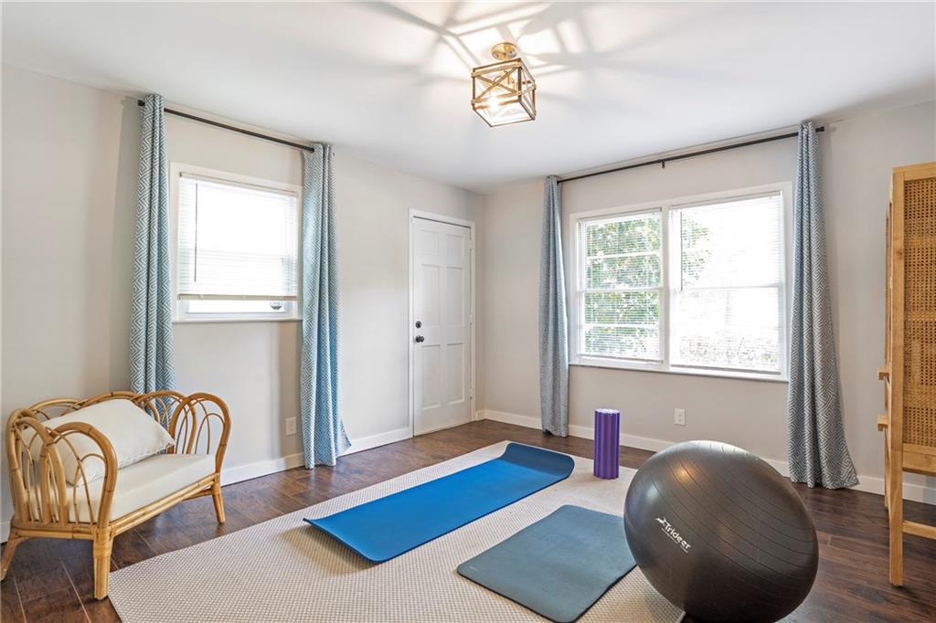 2632 Hawthorne Place Northeast Atlanta, GA 30345 - Photo 38 of 40 a bedroom with a bed and a chandelier