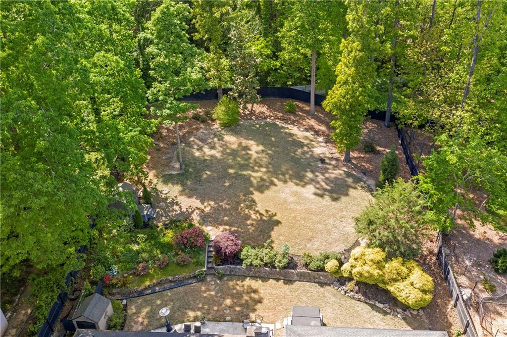 2632 Hawthorne Place Northeast Atlanta, GA 30345 - Photo 5 of 40 a view of a pathway both side of yard