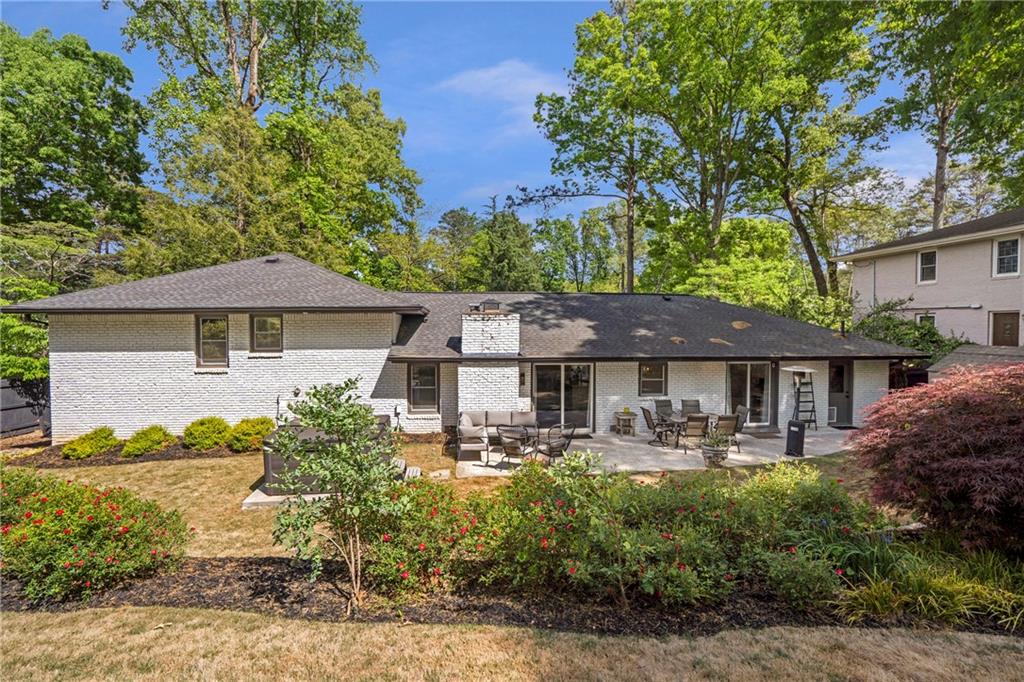 2632 Hawthorne Place Northeast Atlanta, GA 30345 - Photo 8 of 40 a front view of a house with garden