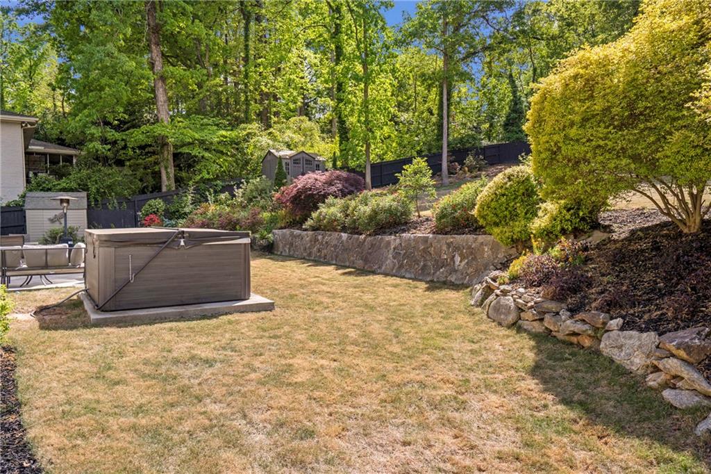 2632 Hawthorne Place Northeast Atlanta, GA 30345 - Photo 10 of 40 a view of backyard with plants and trees