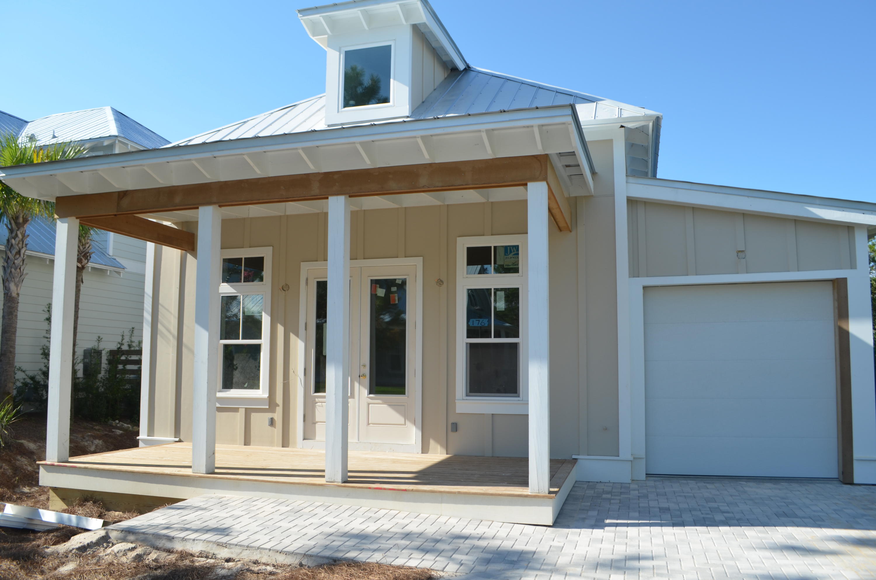 176 Grande Pointe Cirlce Inlet Beach Inlet Beach, FL 32461 - Photo 2 of 29 a view of a house with a door and a window