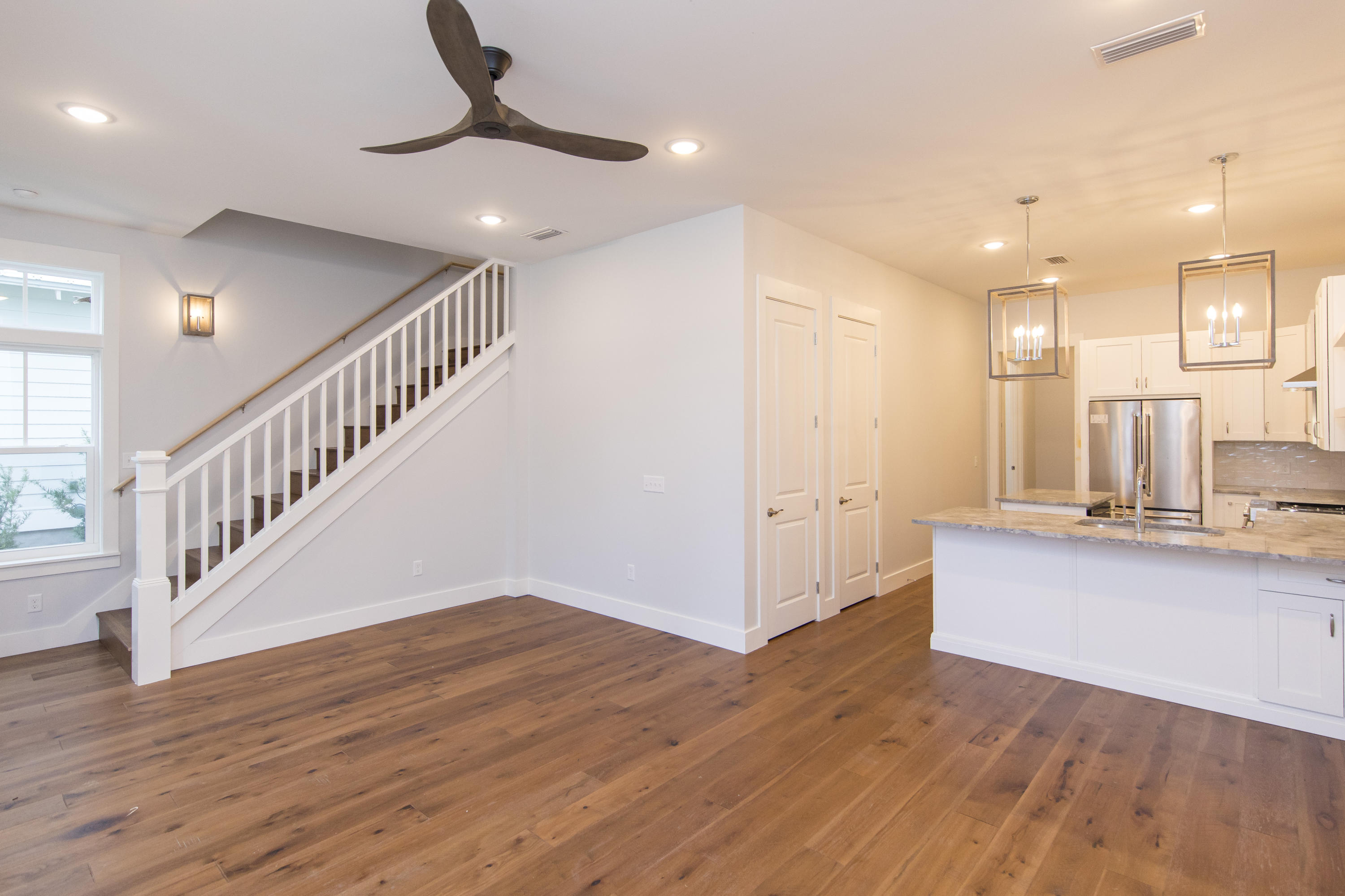 176 Grande Pointe Cirlce Inlet Beach Inlet Beach, FL 32461 - Photo 7 of 29 a view of kitchen and kitchen with wooden floor