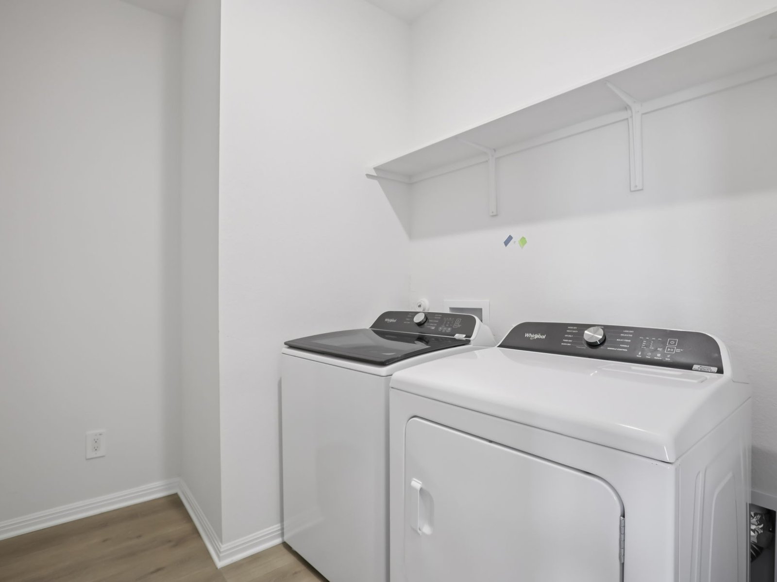 616 Timbo Drive Jarrell, TX 76537 - Photo 12 of 12 a utility room with dryer and washer