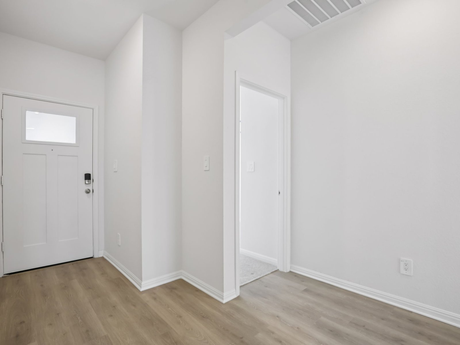 616 Timbo Drive Jarrell, TX 76537 - Photo 4 of 12 an empty room with wooden floor