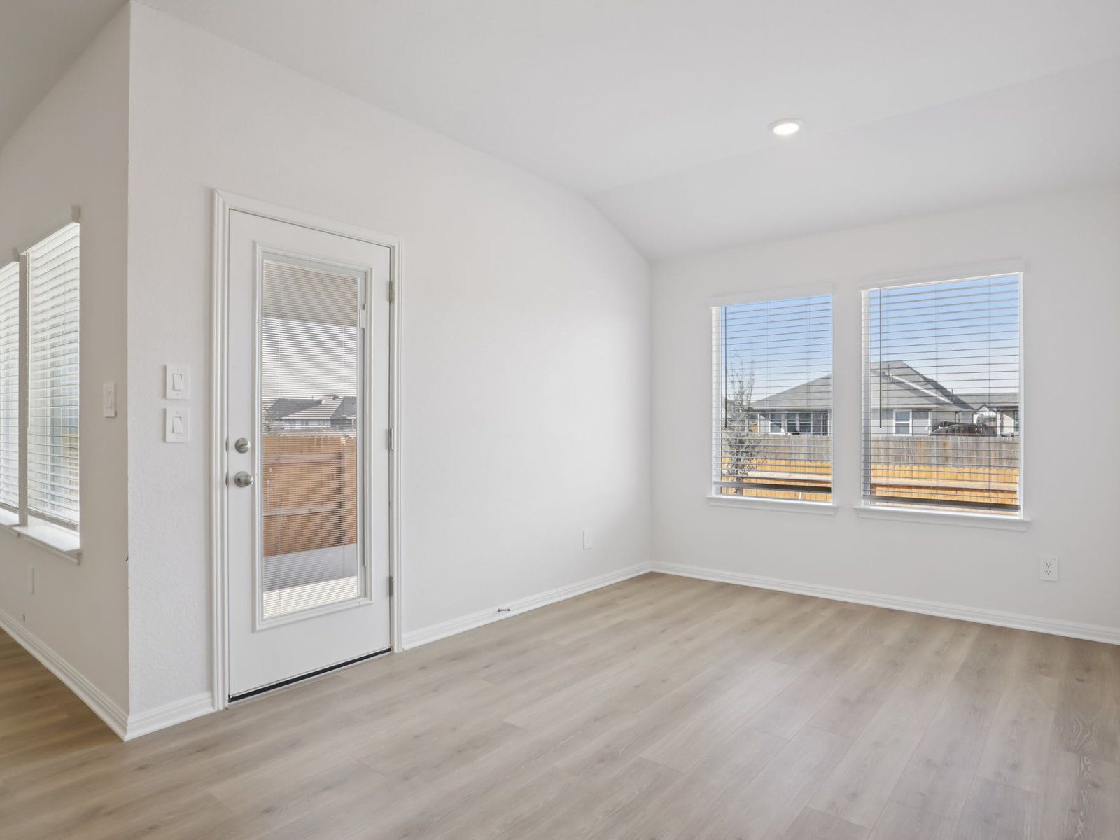 616 Timbo Drive Jarrell, TX 76537 - Photo 8 of 12 a view of livingroom with hardwood floor and window