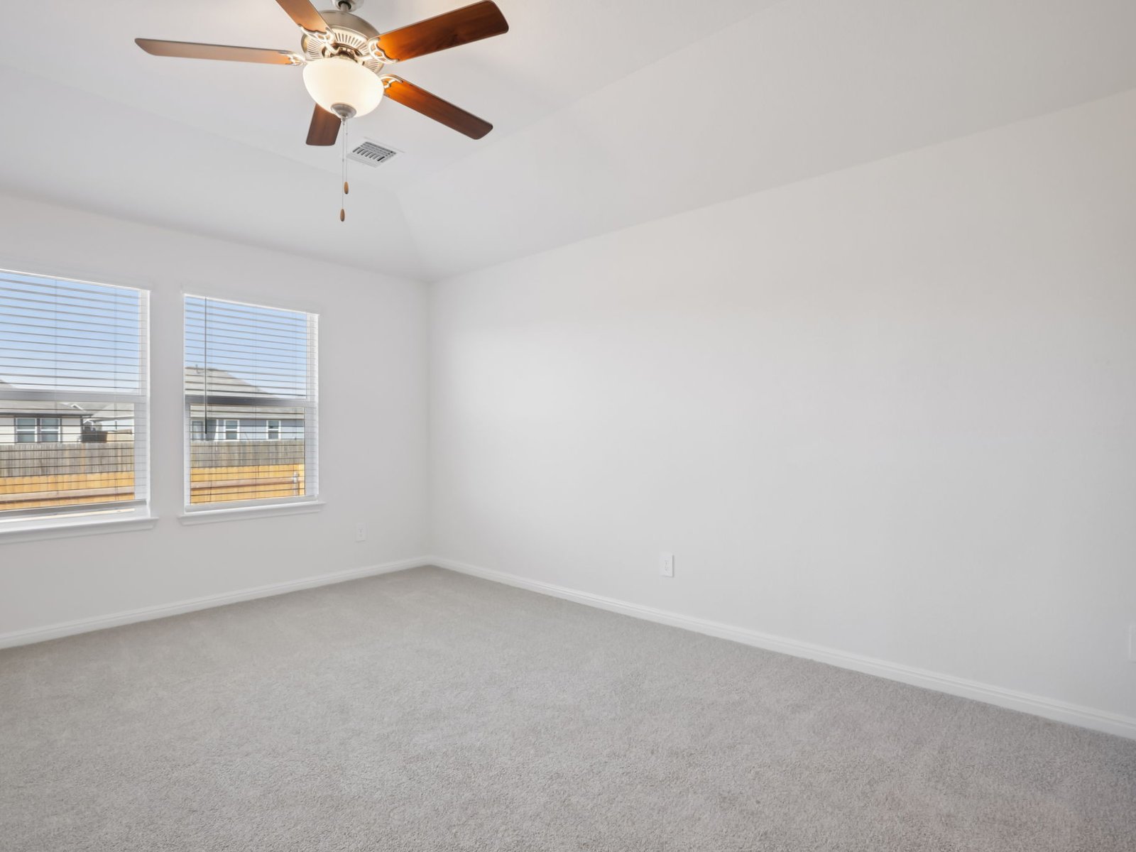 616 Timbo Drive Jarrell, TX 76537 - Photo 9 of 12 an empty room with windows and fan