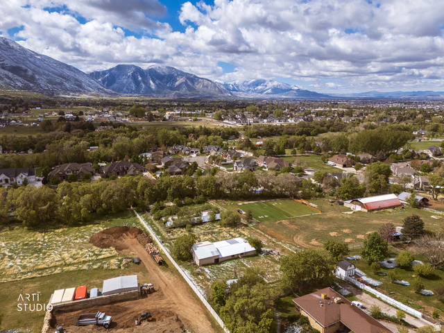 2672 East Canyon Road Springville, UT 84663 - Photo 11 of 33 Aerial view of residential area featuring mountains
