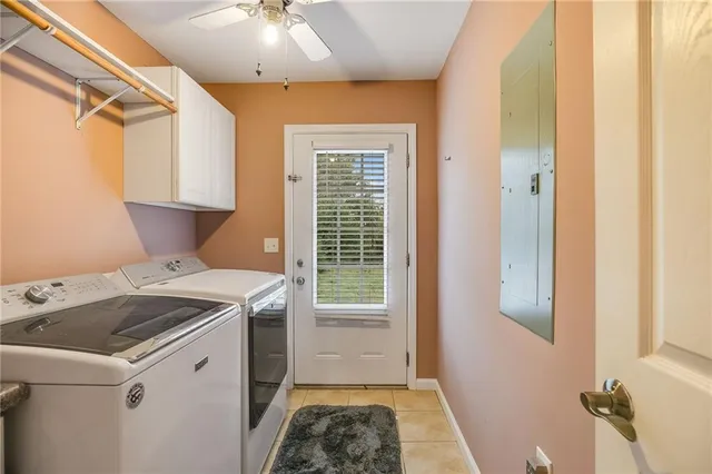 a storage room with a stove and a window