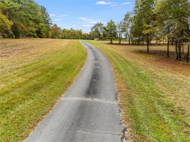 a view of a lake with a yard