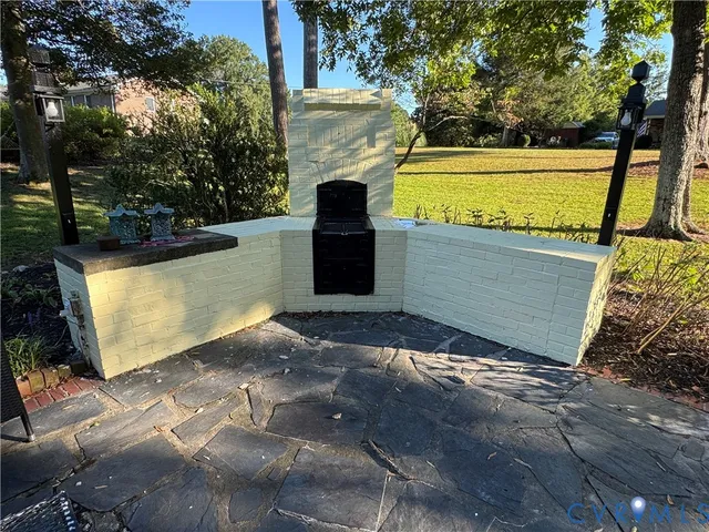 a view of a garden with an outdoor space