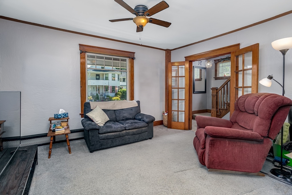 56 Orange Street Athol, MA 01331 - Photo 16 of 39 a living room with furniture and a window
