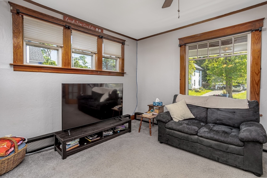 56 Orange Street Athol, MA 01331 - Photo 17 of 39 a living room with furniture and a flat screen tv
