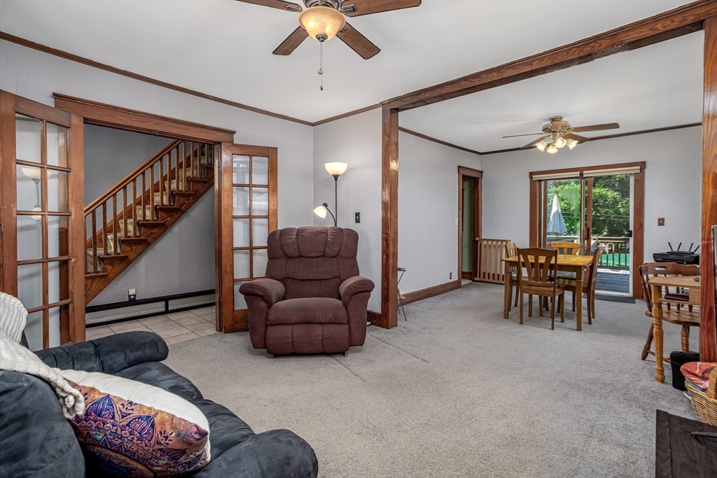 56 Orange Street Athol, MA 01331 - Photo 19 of 39 a living room with furniture and a chandelier