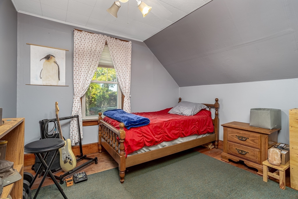 56 Orange Street Athol, MA 01331 - Photo 24 of 39 a bedroom with a bed and a window