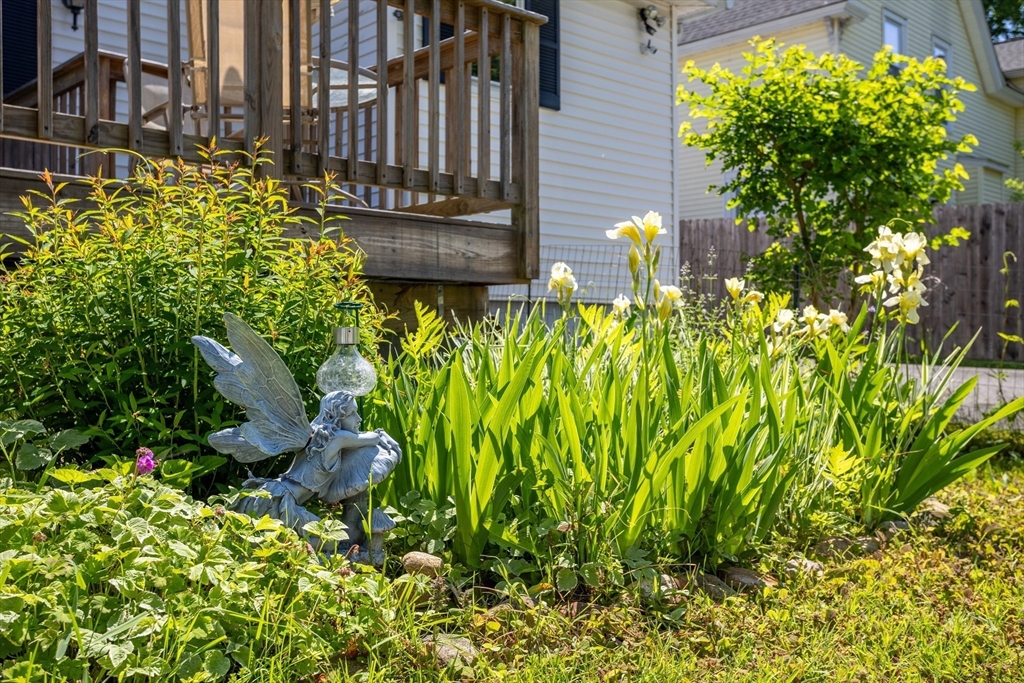 56 Orange Street Athol, MA 01331 - Photo 33 of 39 a view of a garden with plants and bench