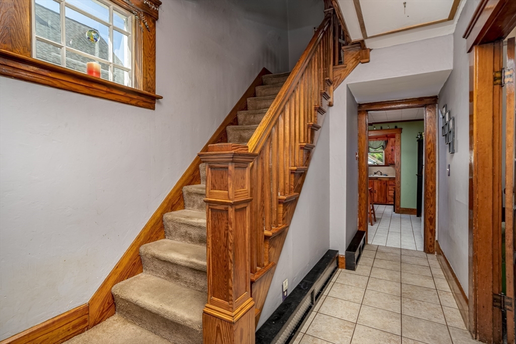 56 Orange Street Athol, MA 01331 - Photo 5 of 39 a view of entryway and hall with wooden floor