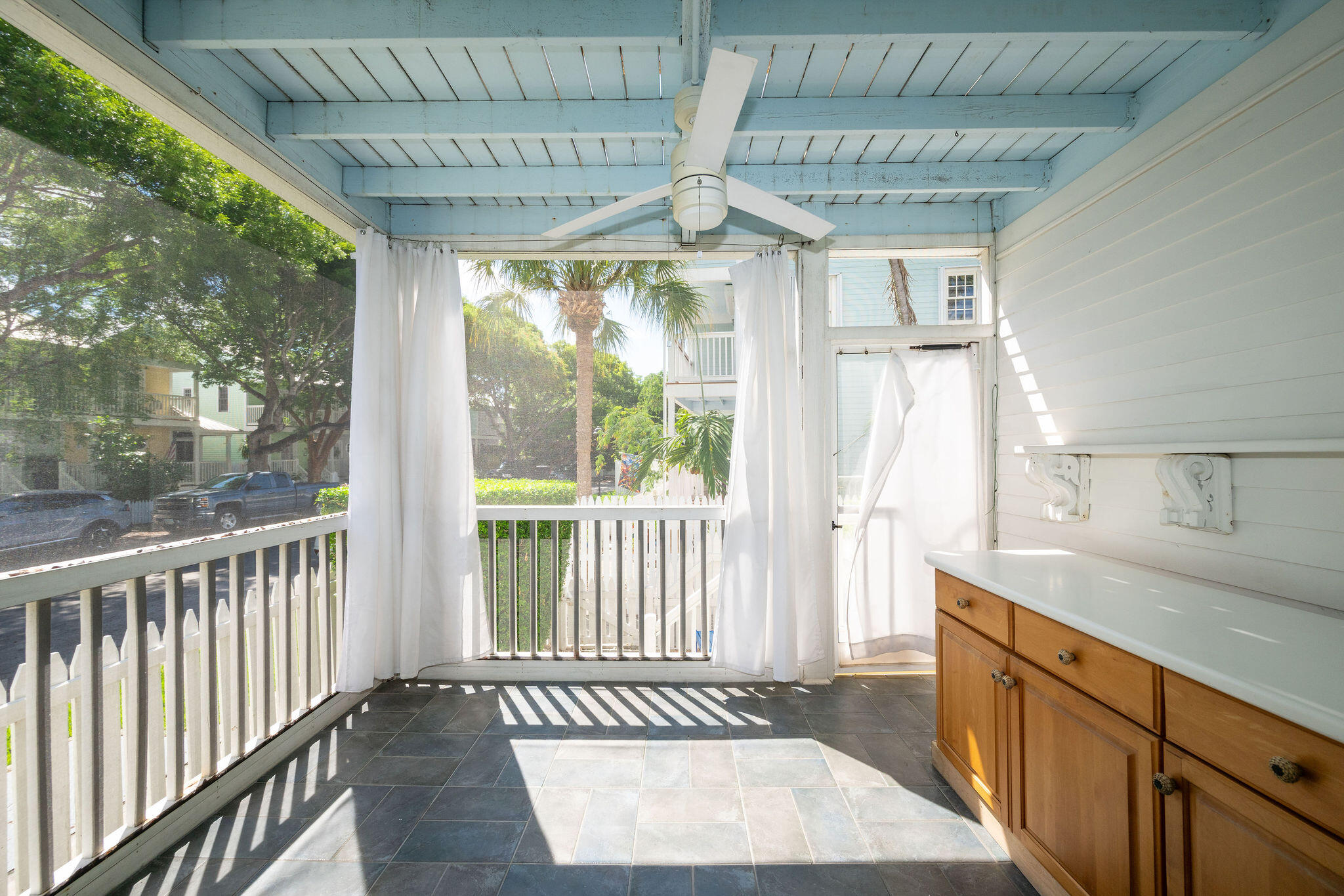 1 Spoonbill Way Key West, FL 33040 - Photo 12 of 38 a view of a porch with wooden floor and outdoor space