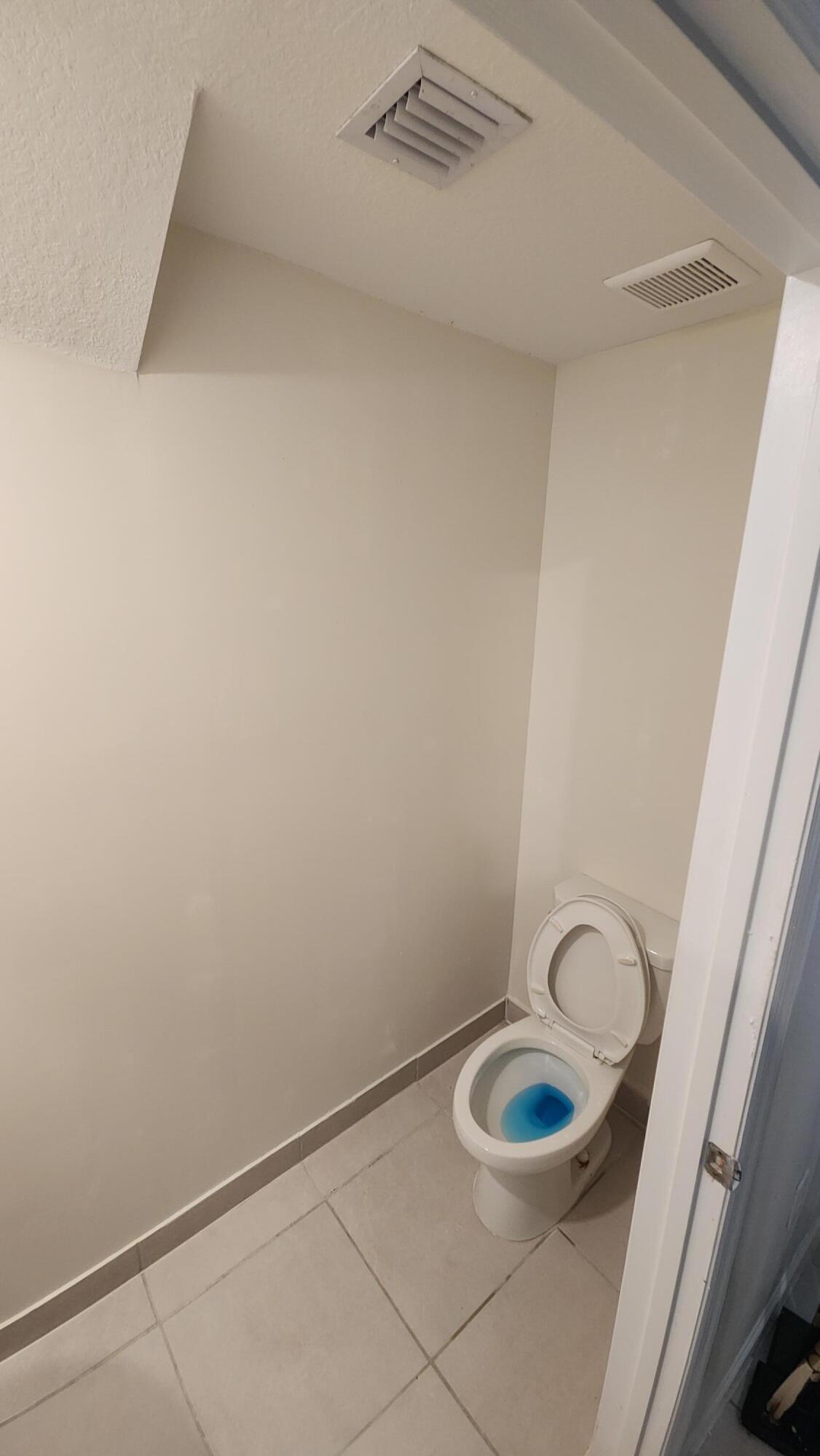 6002 Clydesdale Court Davie, FL 33314 - Photo 11 of 28 a bathroom with a sink and a mirror