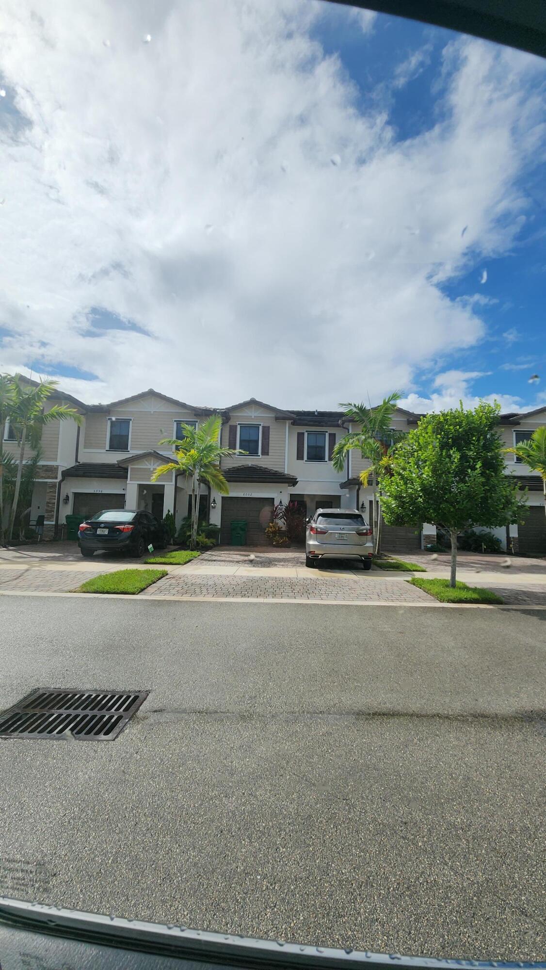 6002 Clydesdale Court Davie, FL 33314 - Photo 21 of 28 a car parked on the side of the road
