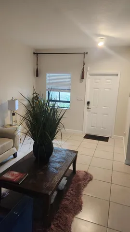 a vase of flowers sitting on a table