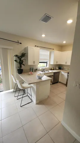 a kitchen with a sink cabinets and counter space
