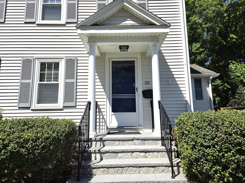 25 Waldeck Road Milton, MA 02186 - Photo 2 of 34 front view of a house with a window