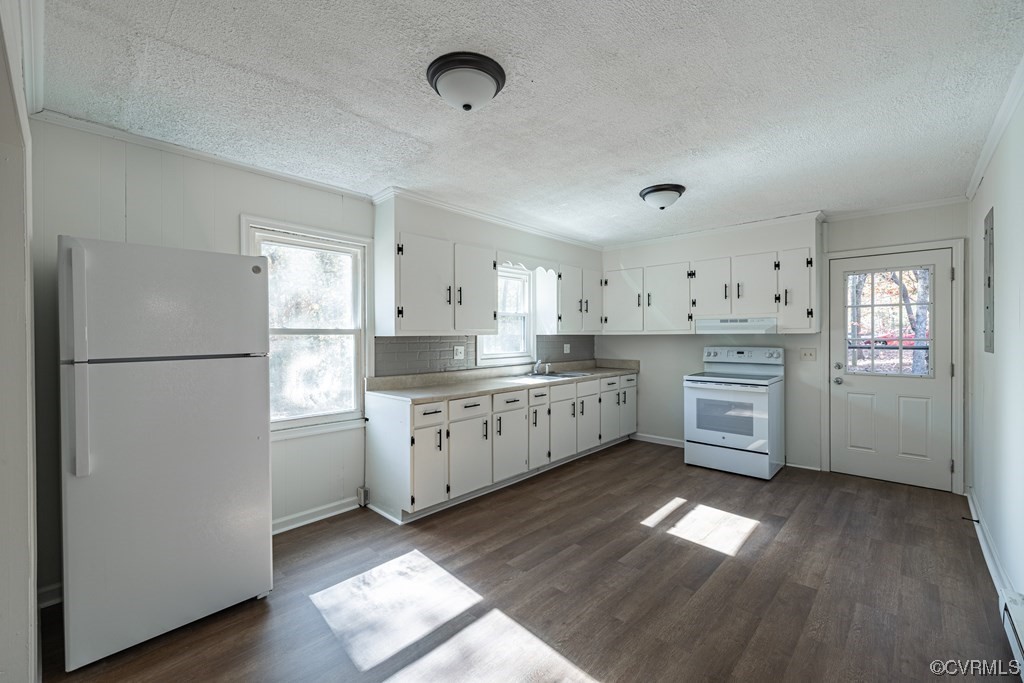 1122 Countyline Road Keysville, VA 23947 - Photo 8 of 20 a kitchen with stainless steel appliances a refrigerator sink and cabinets