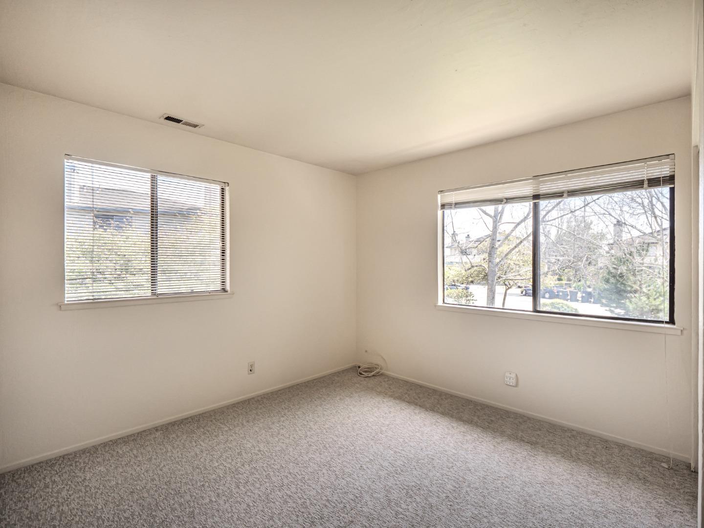 216 Silver Leaf Drive, Unit C Watsonville, CA 95076 - Photo 19 of 36 an empty room with a window