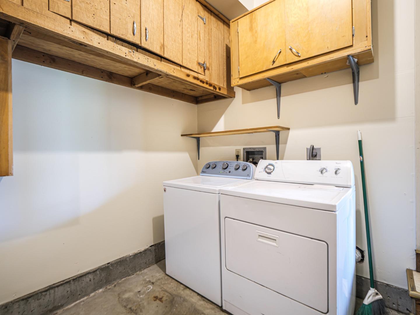 216 Silver Leaf Drive, Unit C Watsonville, CA 95076 - Photo 26 of 36 a utility room with dryer and washer