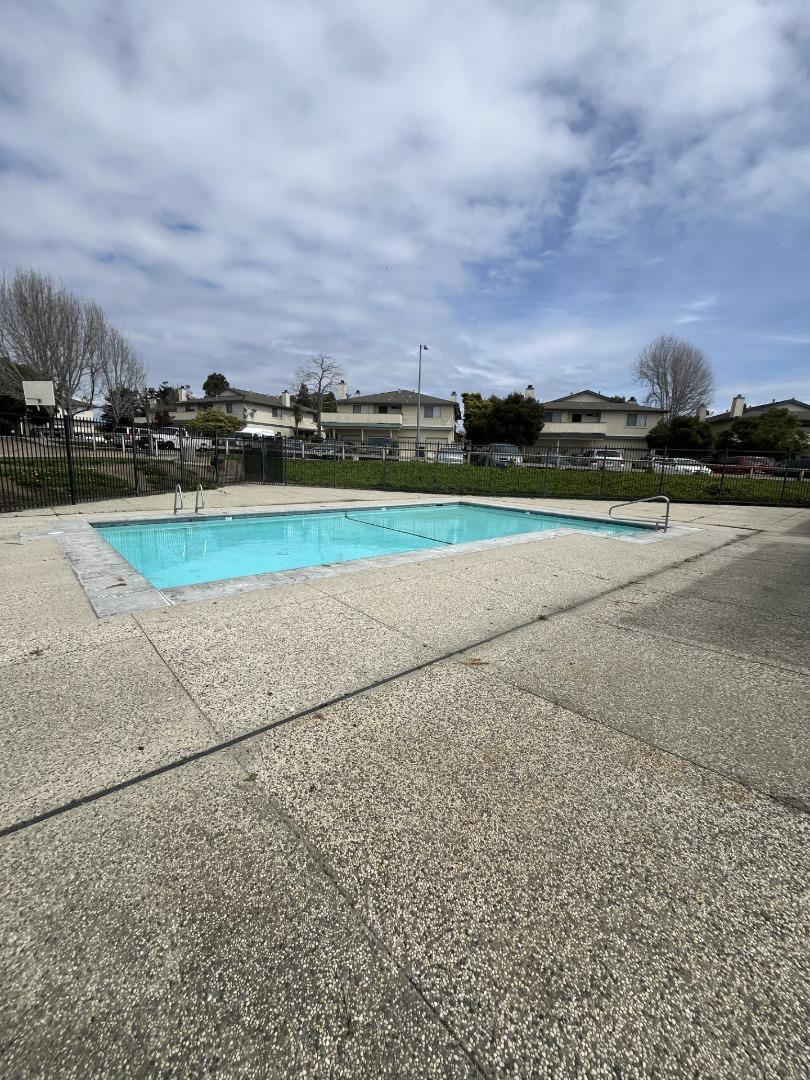 216 Silver Leaf Drive, Unit C Watsonville, CA 95076 - Photo 34 of 36 front view of a house with a yard