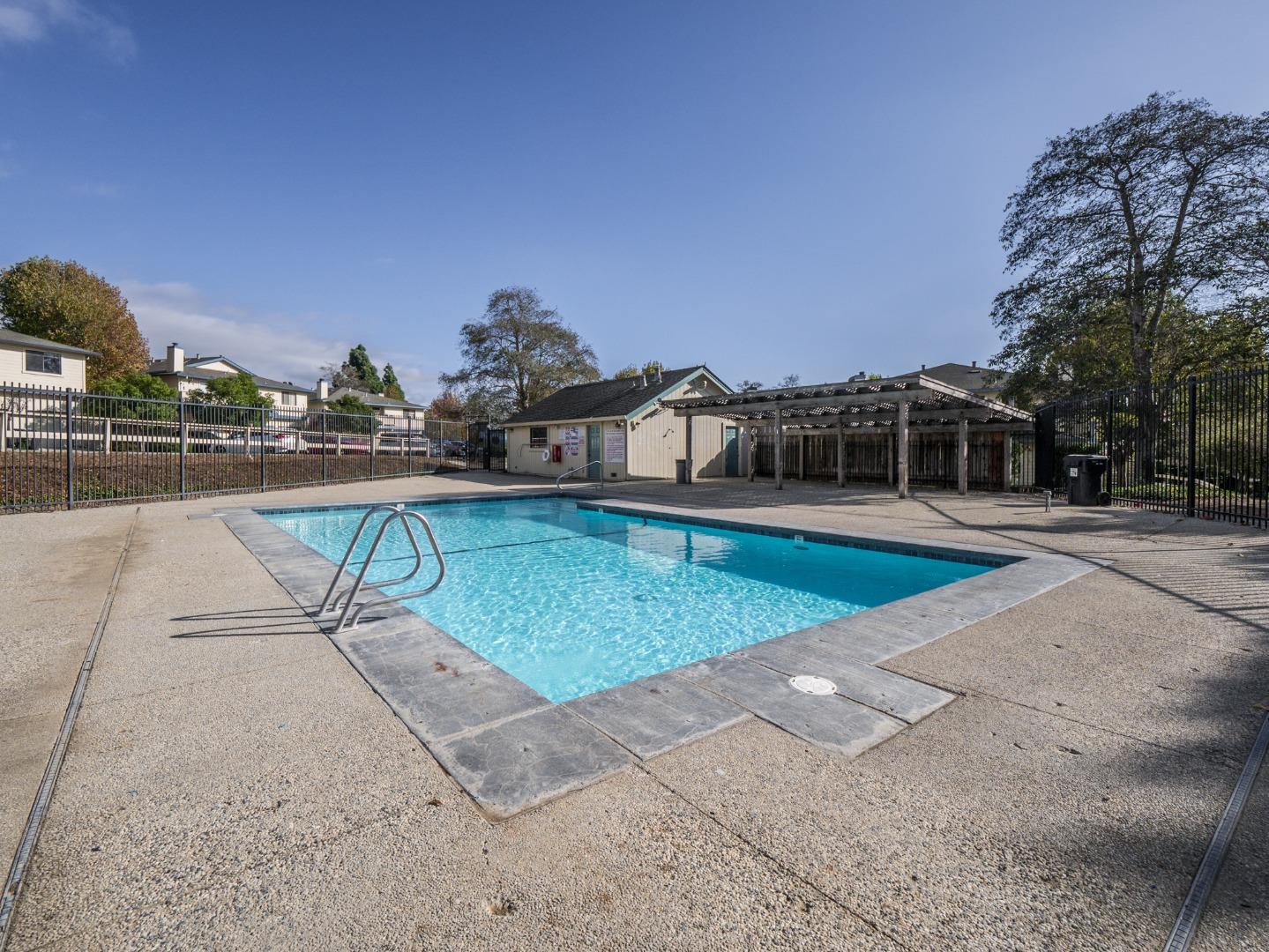 216 Silver Leaf Drive, Unit C Watsonville, CA 95076 - Photo 35 of 36 a view of a swimming pool