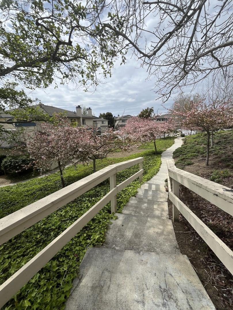 216 Silver Leaf Drive, Unit C Watsonville, CA 95076 - Photo 36 of 36 a view of a yard with wooden fence