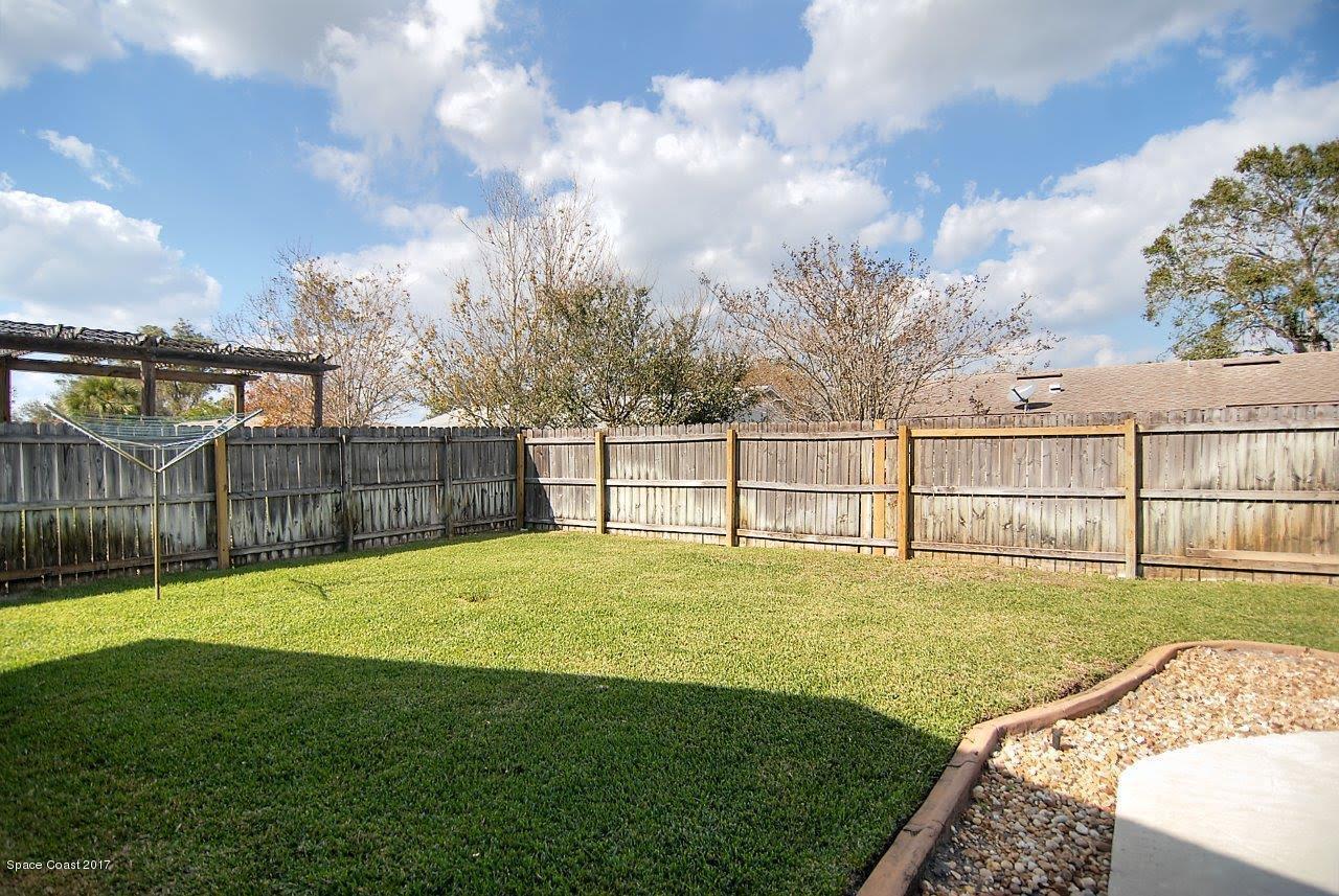 1970 Tallpine Road Melbourne, FL 32935 - Photo 14 of 14 Fenced Backyard
