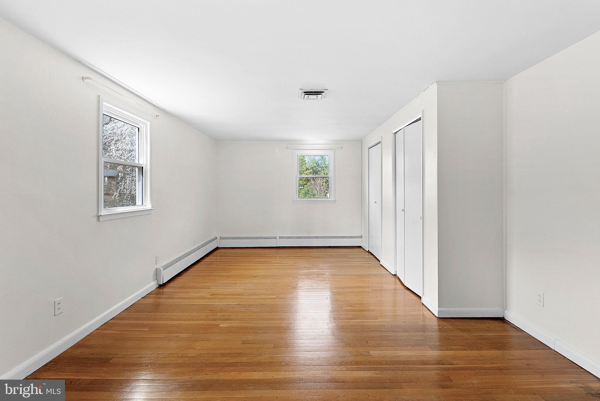 10021 Glenmere Road Fairfax, VA 22032 - Photo 19 of 45 a view of a room with wooden floor and window