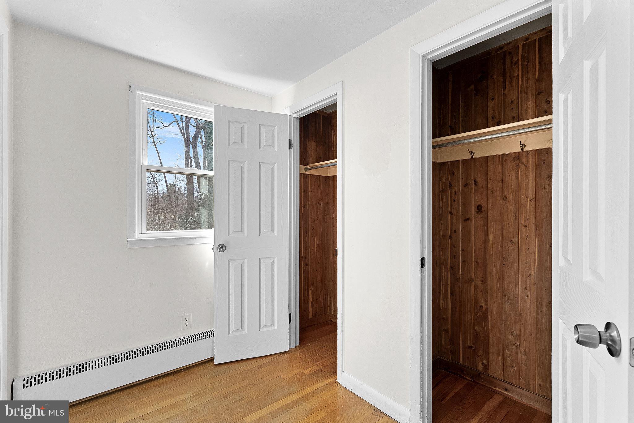 10021 Glenmere Road Fairfax, VA 22032 - Photo 20 of 45 a view of an empty room with closet and wooden floor