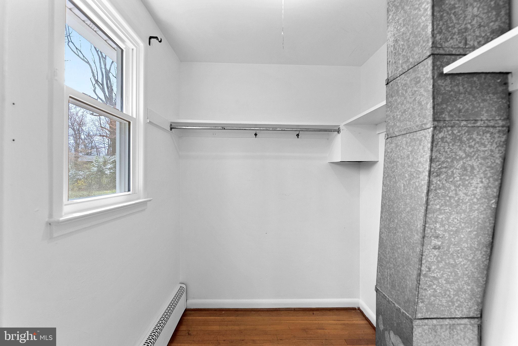 10021 Glenmere Road Fairfax, VA 22032 - Photo 24 of 45 a view of a room with racks on the wall