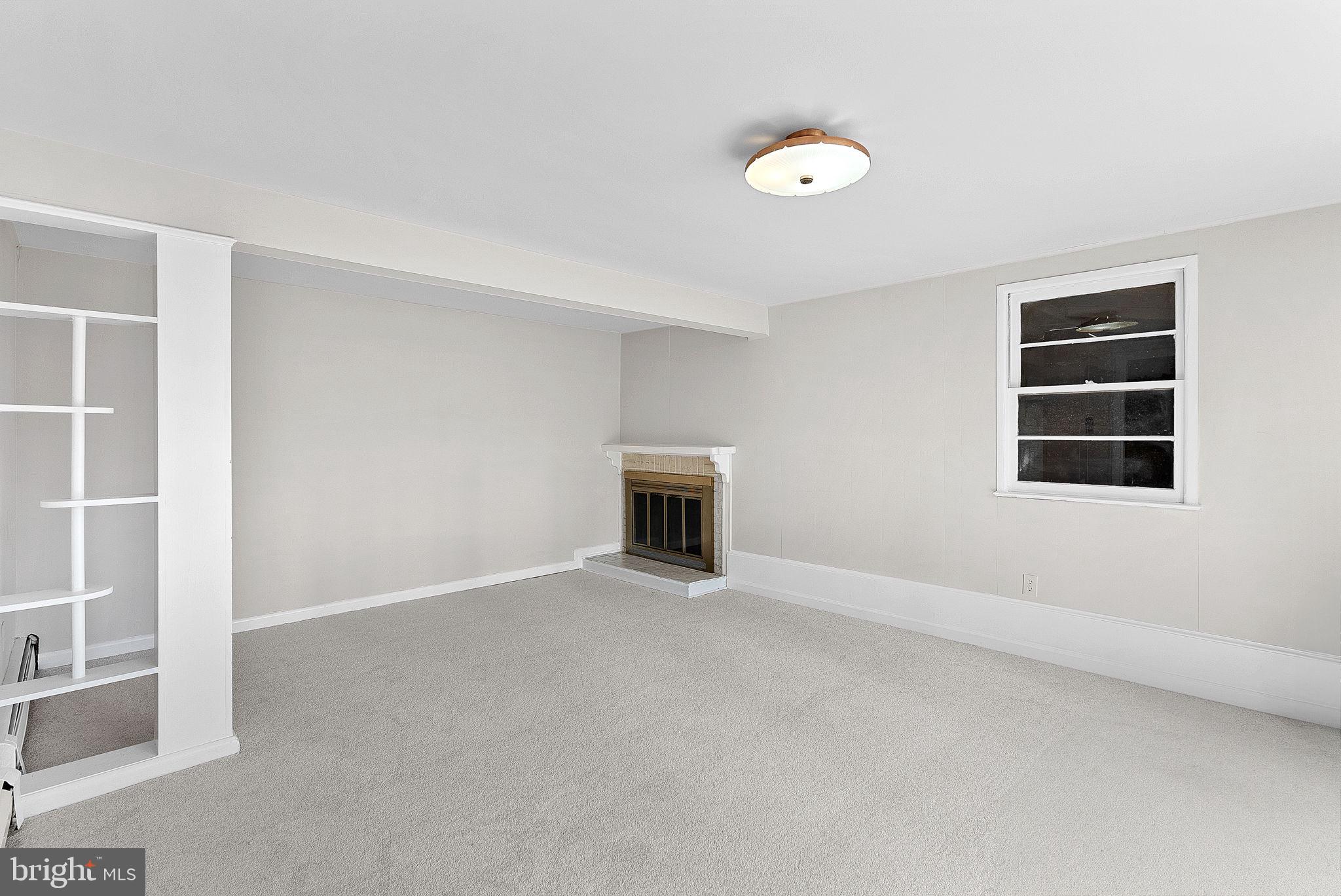 10021 Glenmere Road Fairfax, VA 22032 - Photo 33 of 45 a view of an empty room with a window