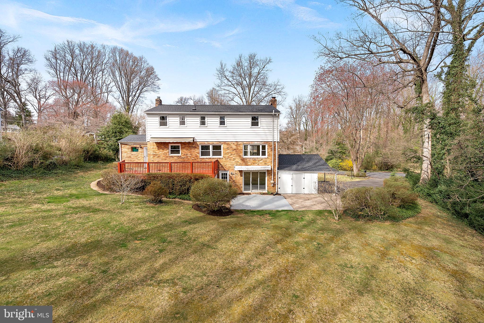 10021 Glenmere Road Fairfax, VA 22032 - Photo 39 of 45 a view of a house with a yard