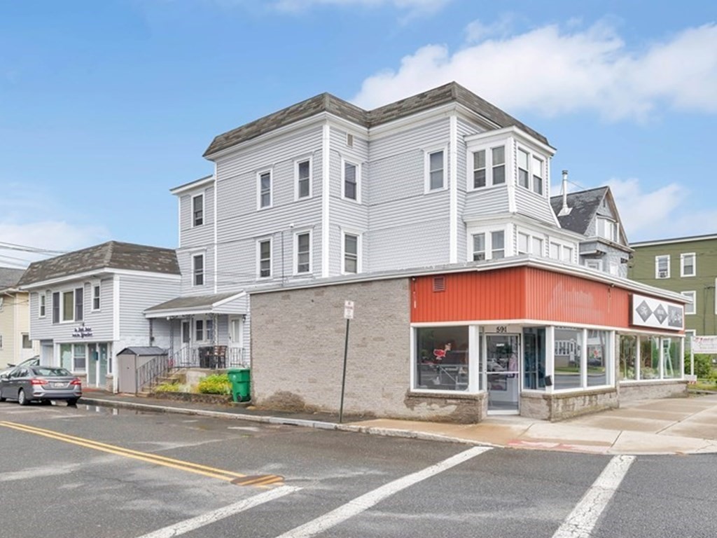a view of a building with a street