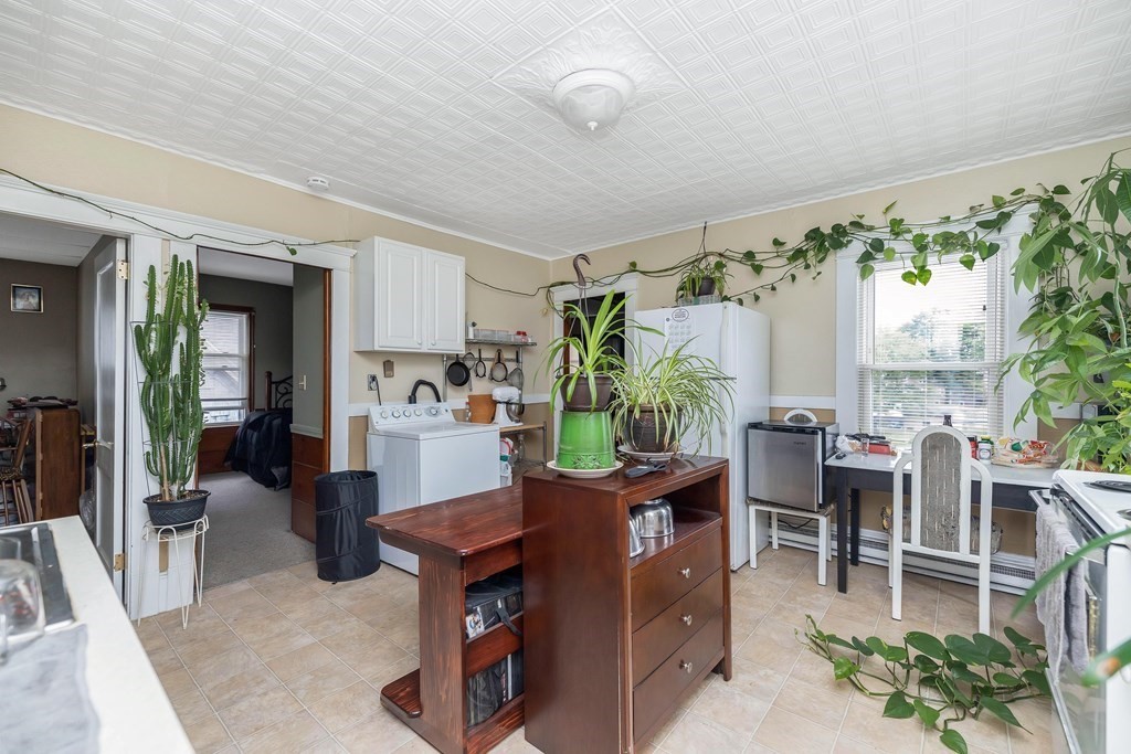591 Grattan Street Chicopee, MA 01020 - Photo 21 of 36 a view of a dining room with furniture window and wooden floor