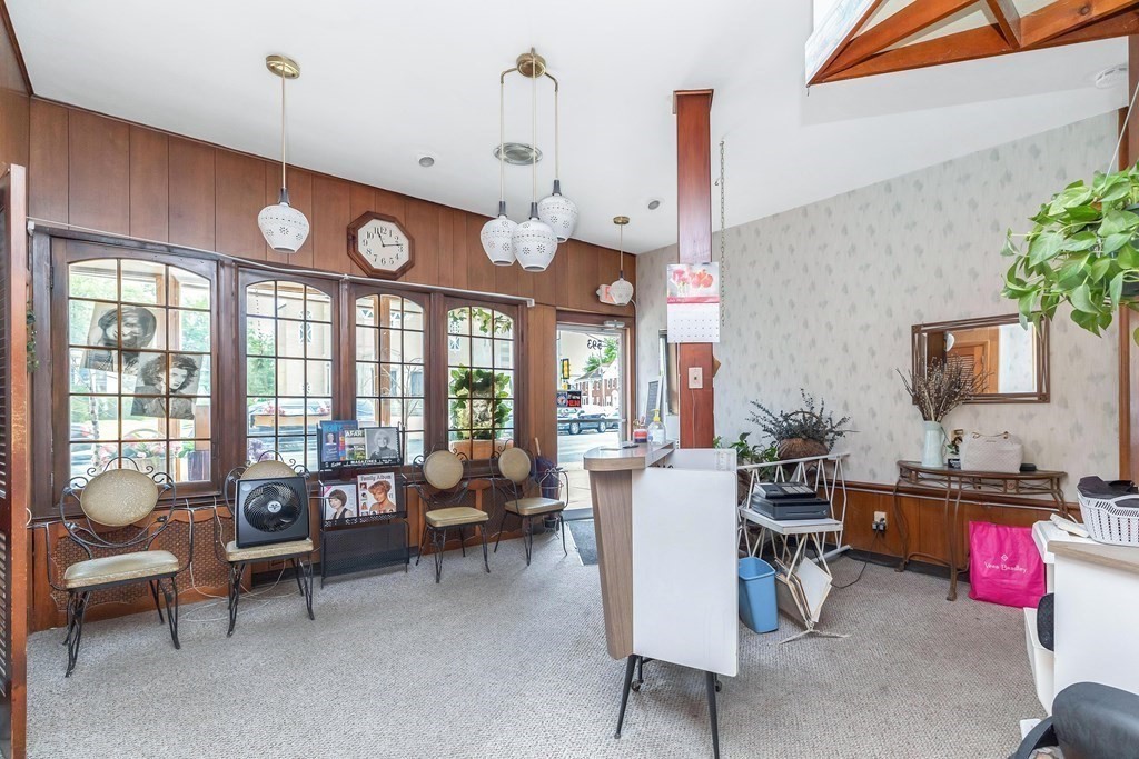 591 Grattan Street Chicopee, MA 01020 - Photo 33 of 36 a living room with furniture kitchen view and large windows