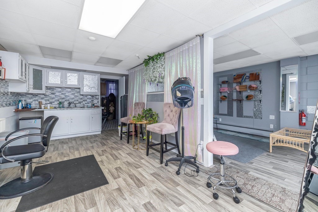 591 Grattan Street Chicopee, MA 01020 - Photo 35 of 36 a living room with furniture and a dining table