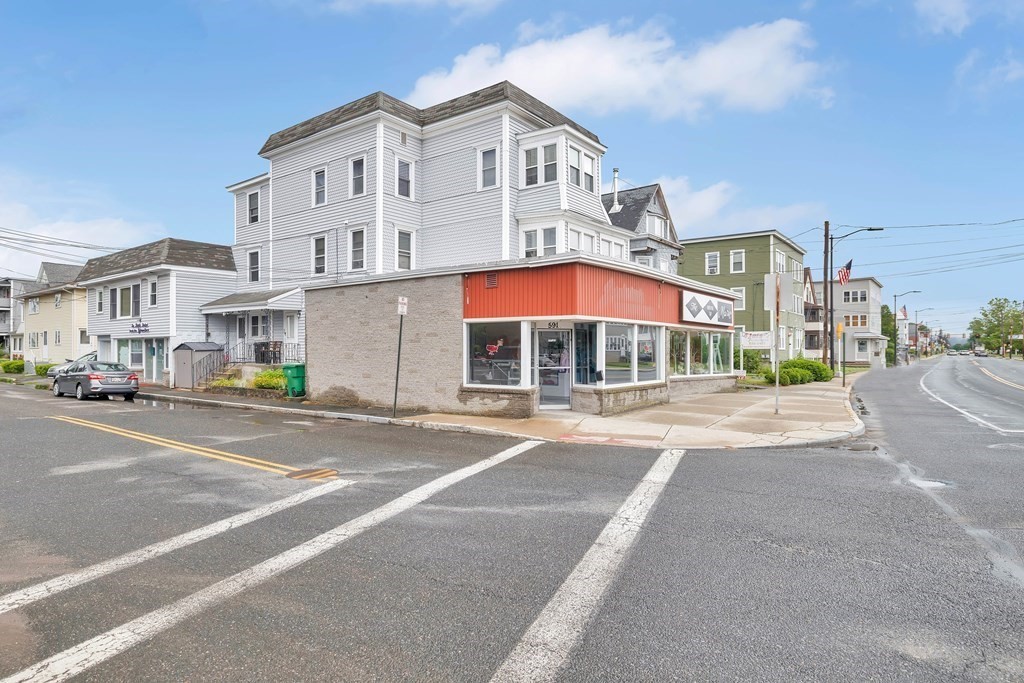 591 Grattan Street Chicopee, MA 01020 - Photo 4 of 36 a view of a building with a street