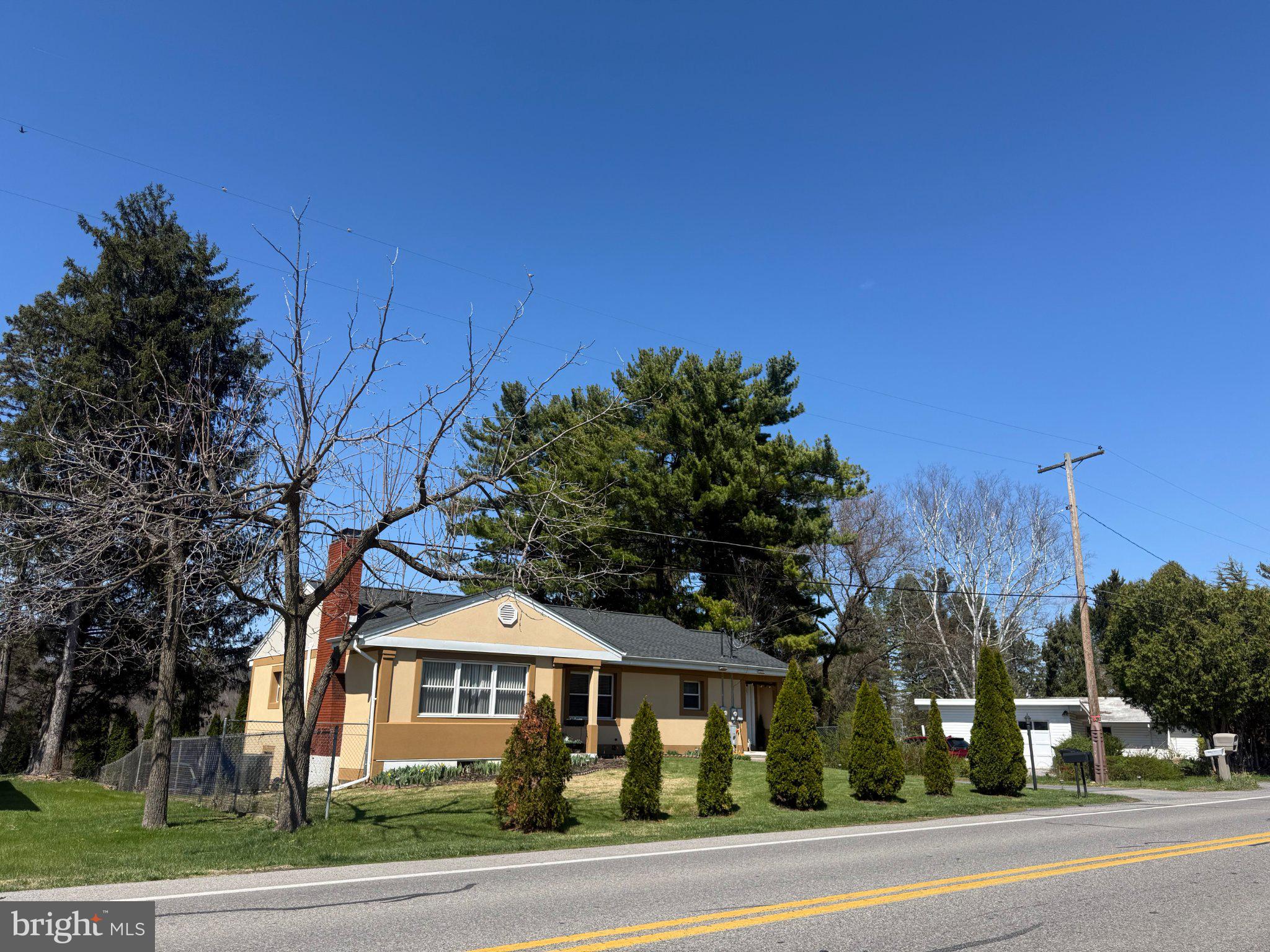 1513 East Branch Road State College, PA 16801 - Photo 1 of 3 Charming home with lush greenery.