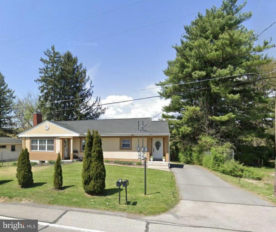 1513 East Branch Road State College, PA 16801 - Photo 3 of 3 Charming home with lush greenery.