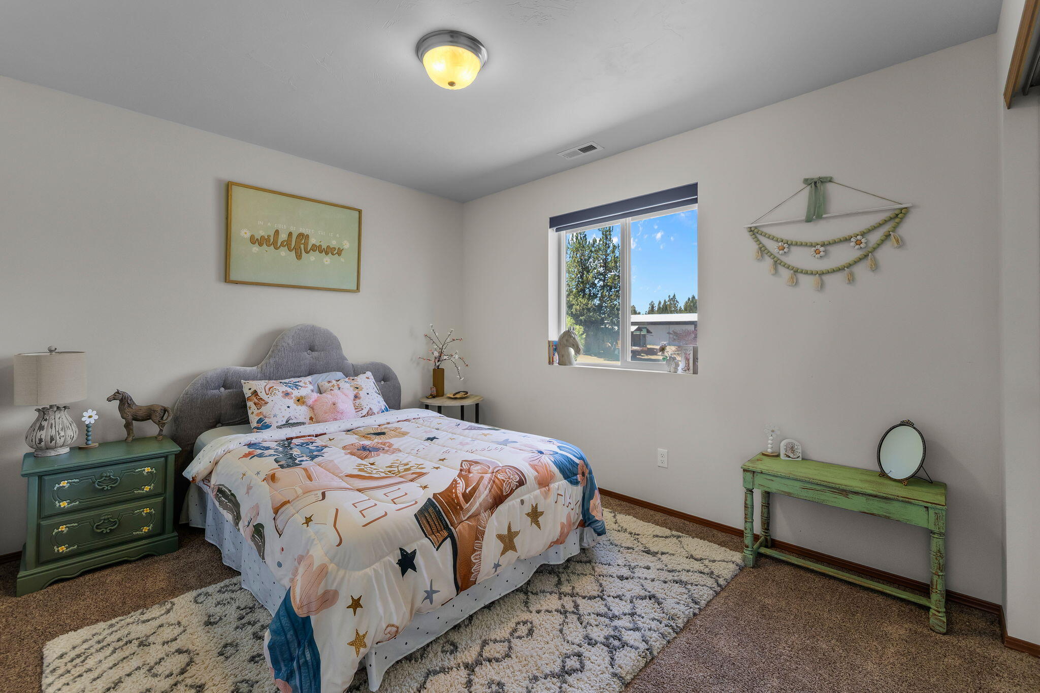 63639 Gentry Loop Bend, OR 97701 - Photo 25 of 40 a bedroom with a bed and a window