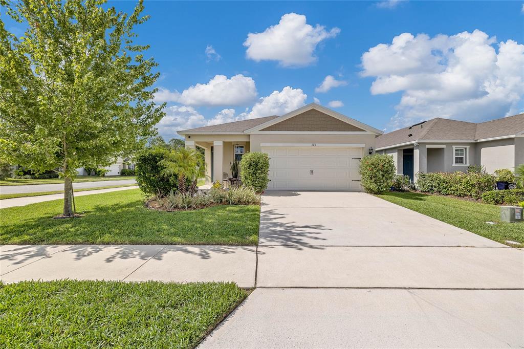 115 Duchess Road DeLand, FL 32724 - Photo 2 of 37 a front view of a house with a yard
