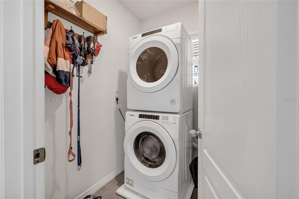 115 Duchess Road DeLand, FL 32724 - Photo 25 of 37 a utility room with dryer and washer